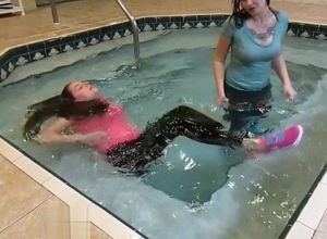 Clad Lesbos in Indoor Pool